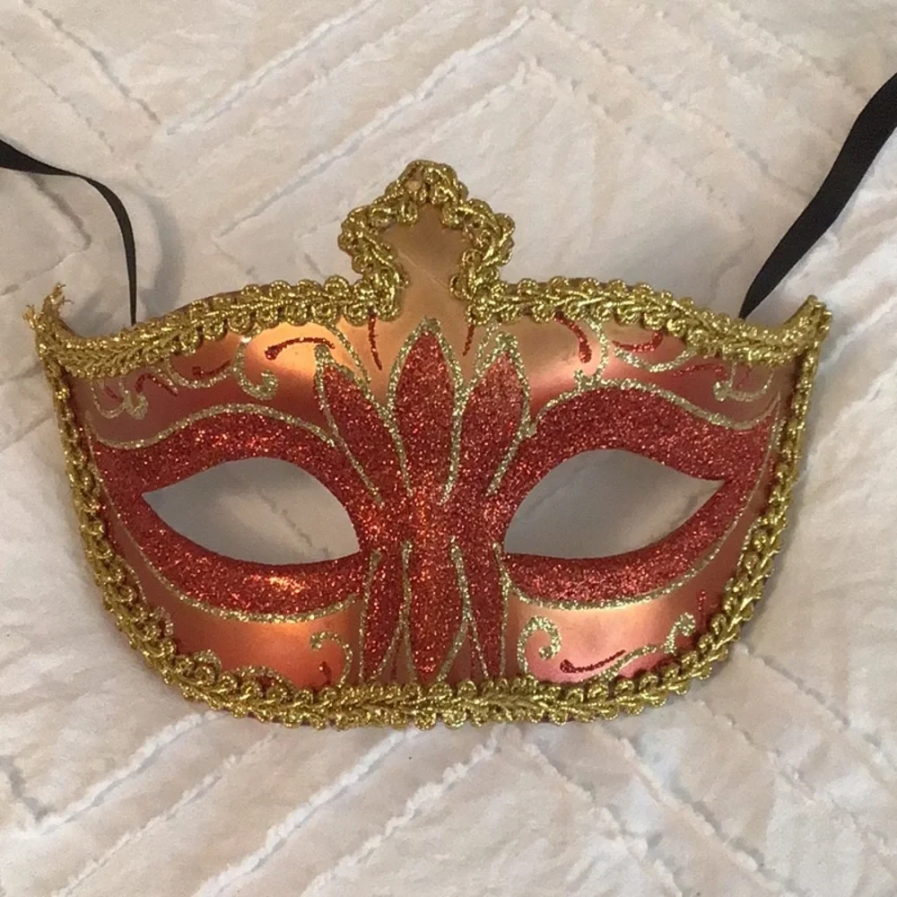 Gold and red sparkly masquerade mask